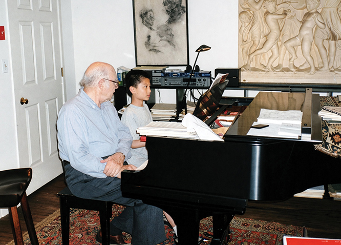 Kevin Zhang at the piano with then-faculty member Benjamin Whitten